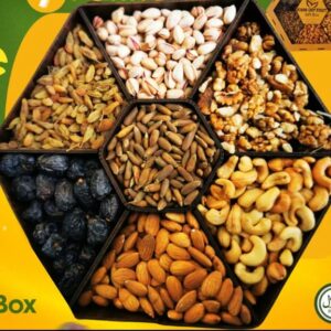 An assortment of premium dry fruits including almonds, walnuts, and dried apricots. Packed with natural goodness, our collection offers a healthy and delicious snacking option. Elevate your wellness journey with our carefully curated dry fruits selection