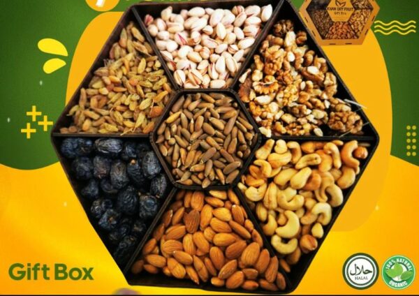 An assortment of premium dry fruits including almonds, walnuts, and dried apricots. Packed with natural goodness, our collection offers a healthy and delicious snacking option. Elevate your wellness journey with our carefully curated dry fruits selection