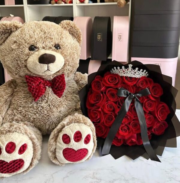 Bouquet of fresh flowers accompanied by an adorable teddy bear – a heartwarming gift to express love and joy. Perfect for special occasions or simply brightening someone's day.