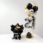 A 21st birthday celebration set including a chocolate bouquet, cake, and balloons, perfect for Birthday gift delivery Pakistan.