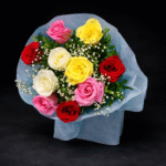 Vibrant Mixed Rose Delivery Lahore bouquet wrapped in pastel blue paper
