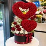 A double heart-shaped rose box available for rose delivery Lahore.