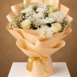 Elegant white bouquet for flower delivery in Lahore.