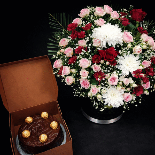 Elegant Flower and Cake Delivery in Lahore featuring a rose bouquet and chocolate cake