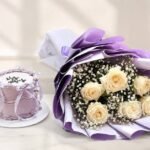 A lavender cake and white rose bouquet, perfect for those looking to send gifts to Lahore.
