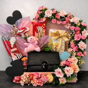 Luxury Gift Basket Delivery Lahore featuring a handbag, teddy bear, and roses