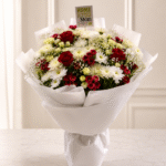 A floral tribute bouquet for customers who Order flowers to Pakistan from UK.