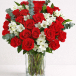 A vibrant arrangement of fresh red roses and white alstroemeria for red rose vase delivery.