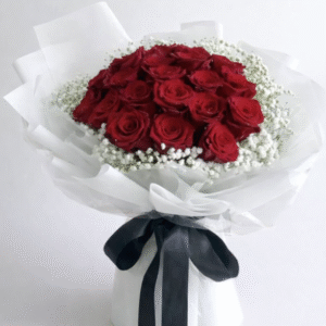 Red Rose Delivery Lahore bouquet with white wrapping and black ribbon