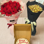 A complete birthday combo delivery set, featuring a red rose bouquet, a Ferrero Rocher chocolate bouquet, and an open boxed cake.