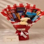 Premium chocolate and flower arrangement, one of the best gifts Lahore.