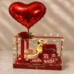 Birthday cake and floral gift box available for gift delivery in Lahore.