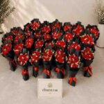 Multiple red rose bouquets arranged by the best florist Lahore for professional delivery.