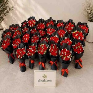 Multiple red rose bouquets arranged by the best florist Lahore for professional delivery.