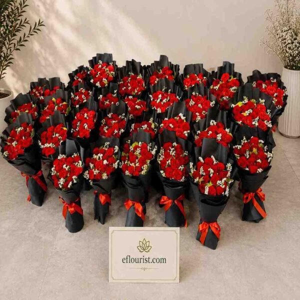 Multiple red rose bouquets arranged by the best florist Lahore for professional delivery.