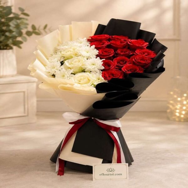 A dual-tone red and white rose bouquet designed by an online florist Lahore.