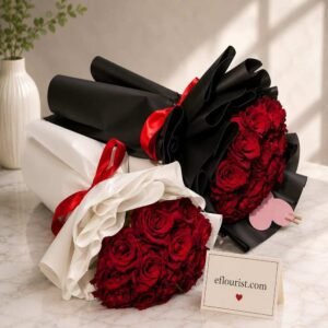 Black and white wrapped rose bundles luxury florist Lahore