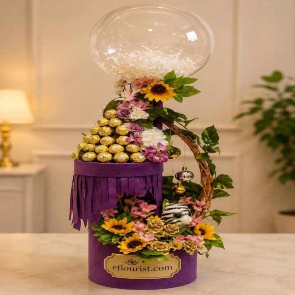 Vertical floral and chocolate gift arrangement for event decoration services Lahore.