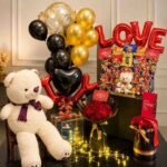 A grand love-themed gift hamper featuring a teddy bear and rose bouquets for Gift delivery Lahore.