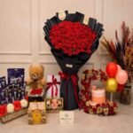 A grand rose bouquet and gourmet gift collection for premium gifts Lahore.