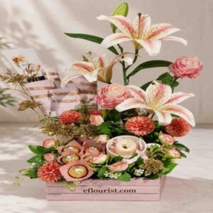 Elegant lilies and chocolates in a box, available through our gift delivery services.