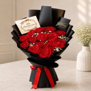 A luxurious red rose bouquet with a "Happy Birthday" card, the perfect birthday rose bouquet Lahore.