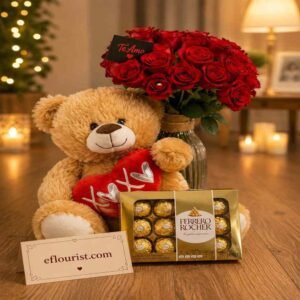 Teddy bear, roses, and chocolate set for anniversary gift delivery.