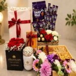 Decorative gift basket with chocolates and nuts from a premier online gift shop Pakistan.