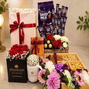 Decorative gift basket with chocolates and nuts from a premier online gift shop Pakistan.